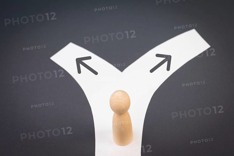 Tanding on a junction, choosing a direction, new oppurtunity, decision making concept, following a path
