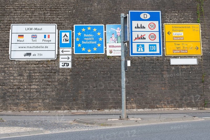 Border crossing to Germany, many road signs inform about speed limits and toll fees on german streets, welcome sign, European Union, frontier to Luxembourg