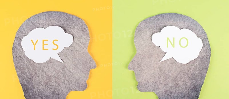 Head silhouettes with speech bubbles, words yes and no, communication between people, business and education concept, minimalism, asking questions, looking for an answer