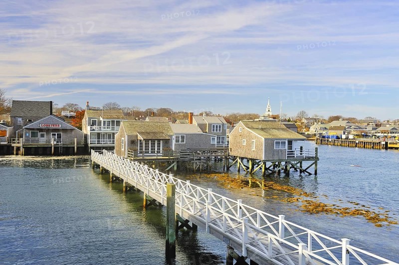 View of the island of Nantucket from the ferry arriving at Nantucket Harbor, Nantucket, Massachusetts, (part of Cape Cod and the Islands) USA