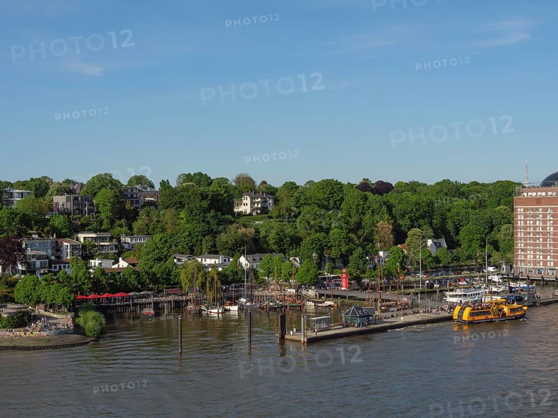 Idyllic harbour view with boats and surrounding buildings, surrounded by greenery, Elbe, Hamburg, Northern Germany, Germany, Europe