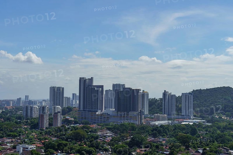 Modern cityscape with tall skyscrapers under a sky with light clouds, Pattaya, Thailand, Asia