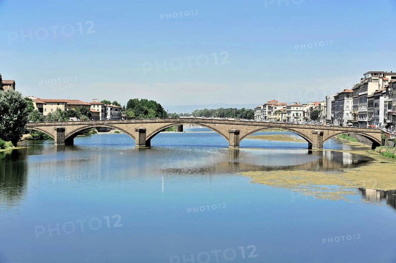 River Arno with Ponte S. Trinita, Florence, Tuscany, Italy, Europe, A wide bridge over a quiet river in the city under a clear summer sky, Europe