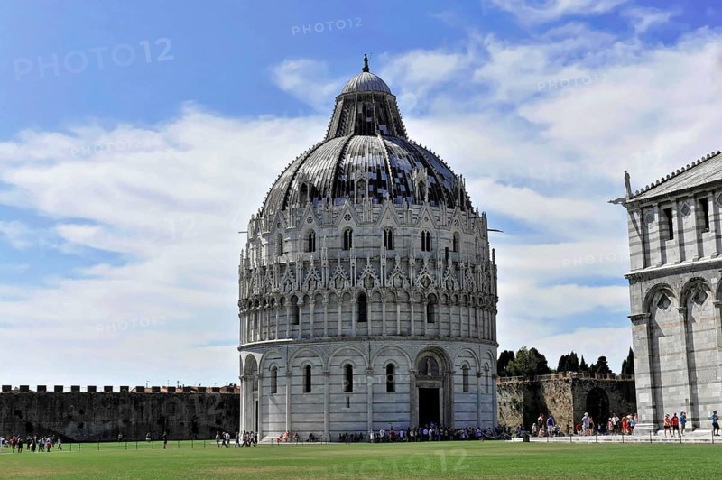 UNESCO World Heritage Site, Pisa, Tuscany, Italy, Europe, The Baptistery of Pisa with its impressive dome and detailed architectural elements, blue sky in the background, Europe