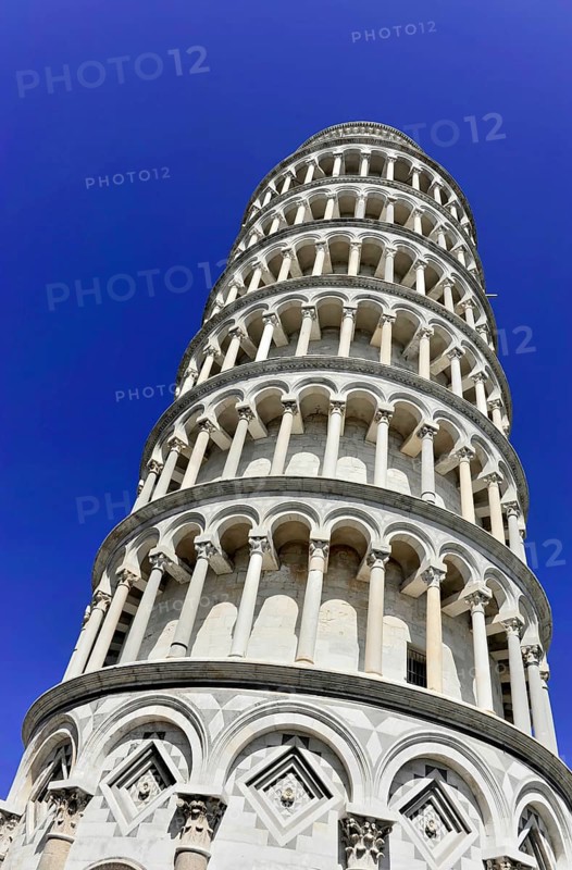 UNESCO World Heritage Site, Pisa, Tuscany, Italy, Europe, The upper part of the Leaning Tower of Pisa with its characteristic arches against a blue sky, Europe