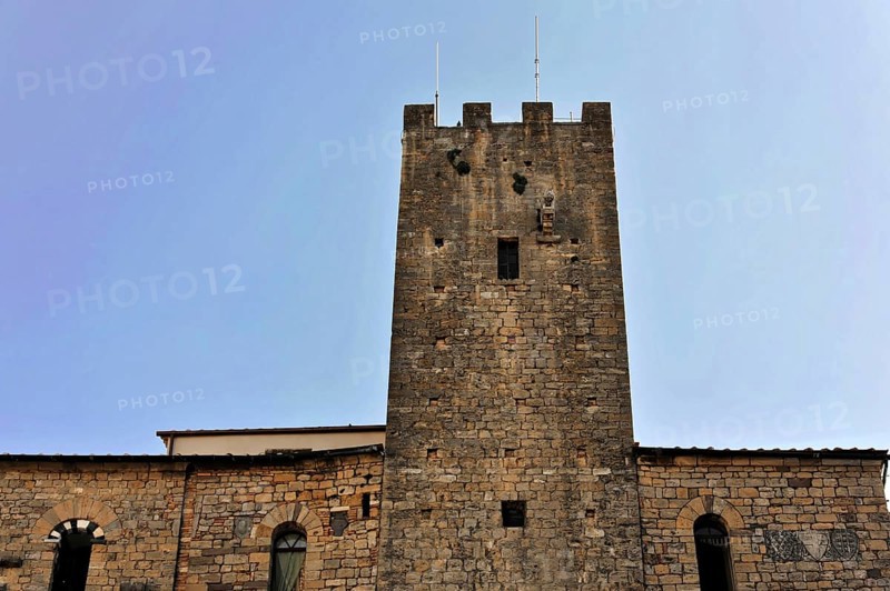 Palazzo dei Priori, City Palace, Volterra, Tuscany, Italy, Europe, A simple medieval stone tower under a blue sky, Europe