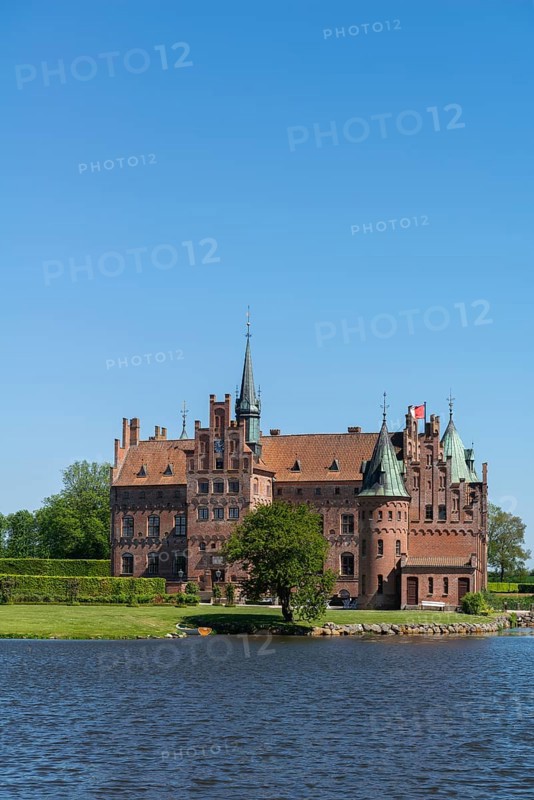 Egeskov moated castle, KvÃ¦rndrup near Svenborg, Svendburg, architecture, round corner towers, stepped gables, lake, Renaissance building, tourist attraction, Fyn, island of Funen, Denmark, Europe