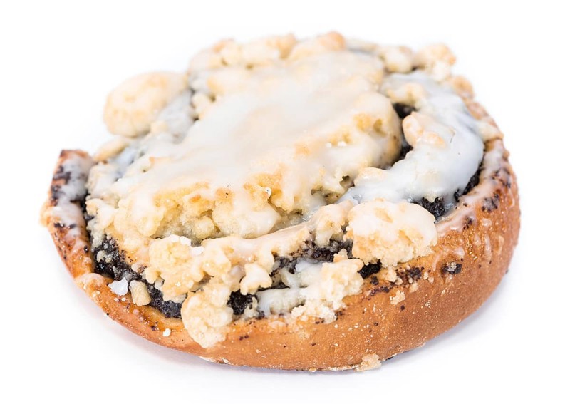 Poppyseed Cake isolated on pure white background (close-up shot)
