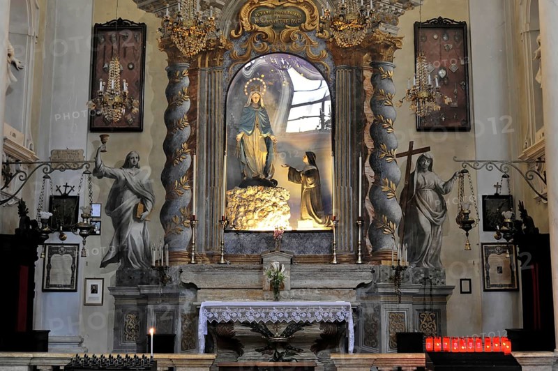 Montepulciano, Val d'Orcia, Province of Siena, Tuscany, Italy, Europe, An ornate altar in a church with statues of saints and detailed decorations, Tuscany, Europe Italy, Europe