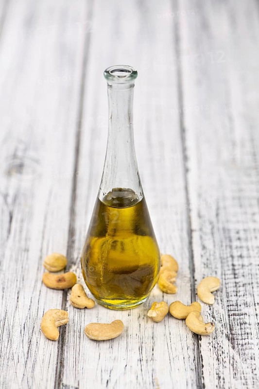 Portion of Cashew Oil (detailed close up shot, selective focus)