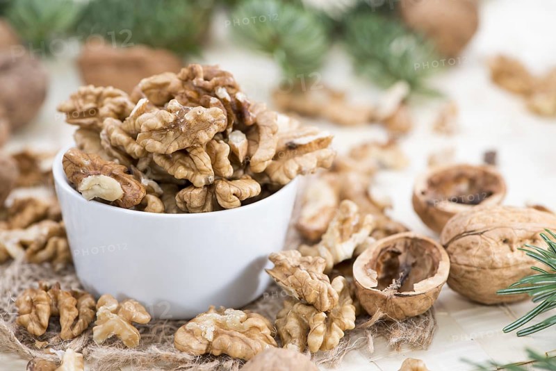 Heap of fresh Walnuts (close-up shot)