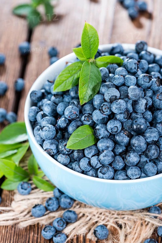 Portion of fresh harvested Blueberries (detailed close-up shot)