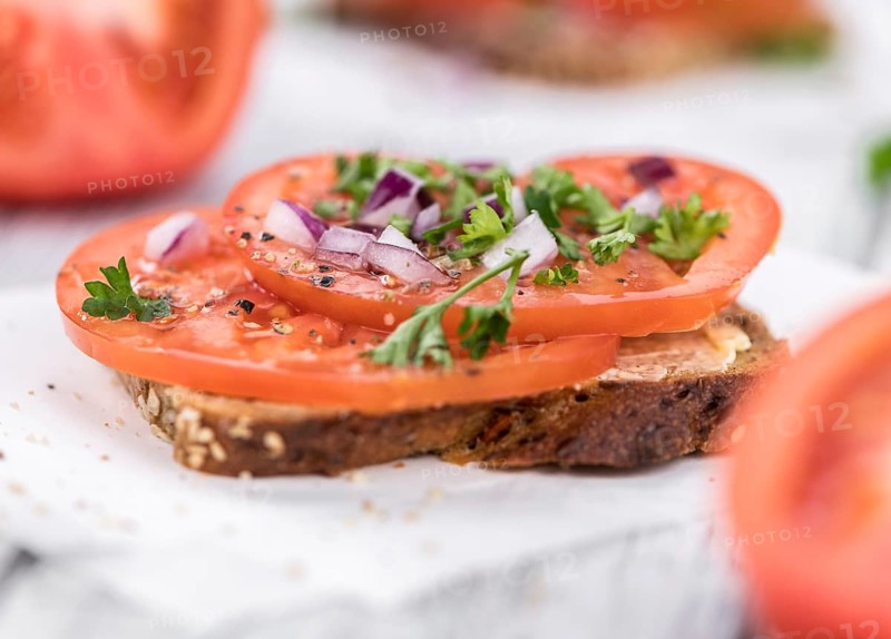 Portion of fresh Tomato Sandwich (selective focus, close-up shot)