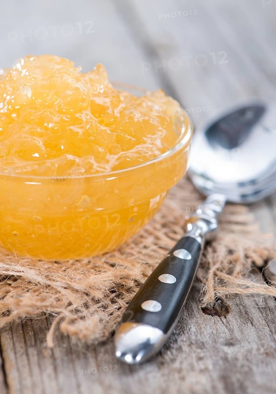 Portion of fresh made Pineapple Jam with some fresh fruits