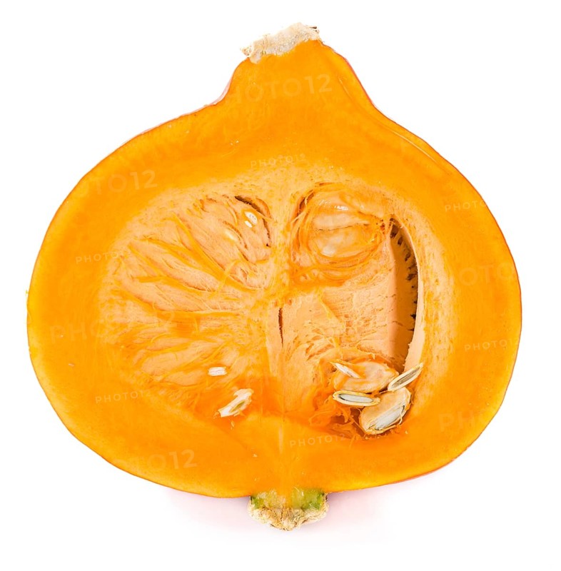 Portion of fresh Pumpkin isolated on white background (close-up shot)