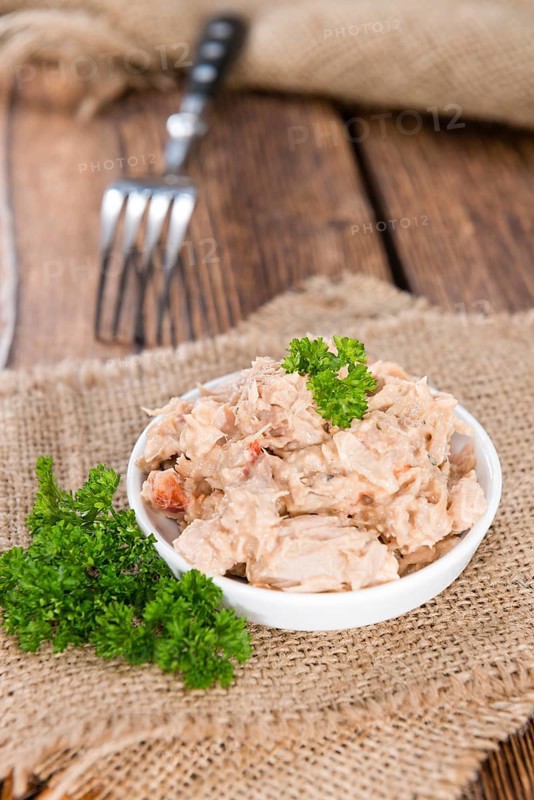 Portion of Tuna salad in a small bowl (close-up shot)