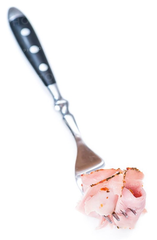 Ham on a fork isolated on pure white background