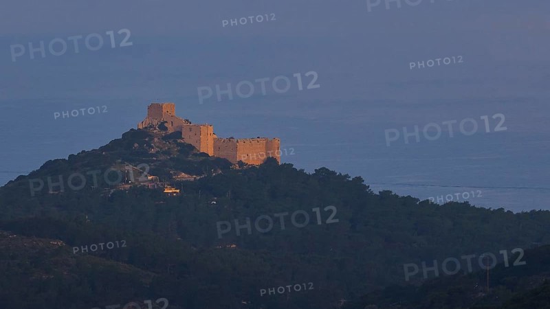 A castle on a hill in the first morning light, surrounded by natural landscape, Kritinia Castle, St John's Castle, Kritinia, Rhodes, Dodecanese, Greek Islands, Greece, Europe