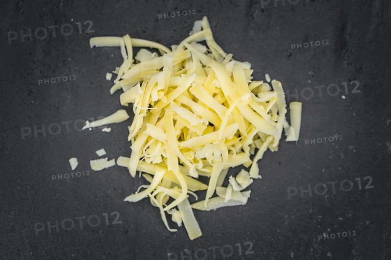Fresh made Grated Cheese as detailed close-up shot