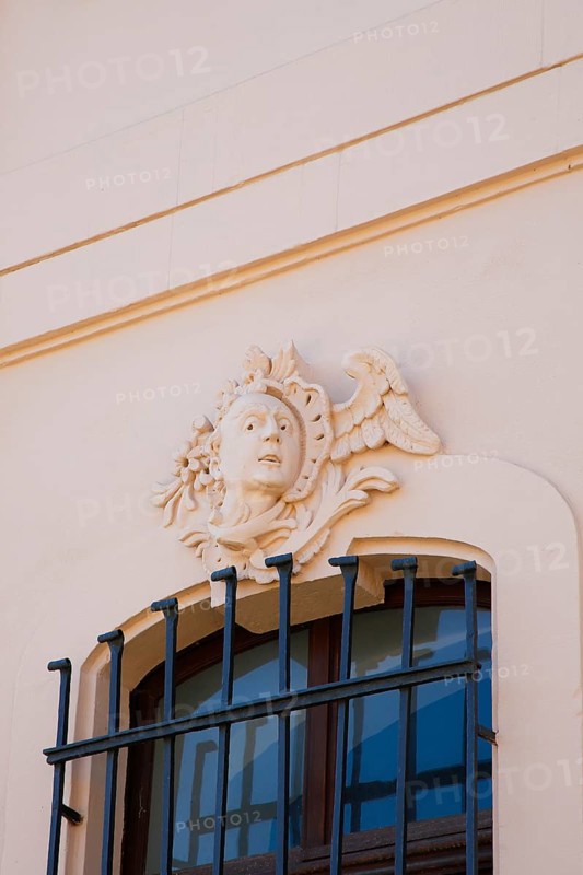 Stadion Castle Bönnigheim, detail, stone relief, window decoration, head, portrait, portrait made of stone, stucco, sculptural moulding of mortar, building, architecture, historical building, late baroque style, master builder Anton Haaf, built in 1756 on behalf of Imperial Count Anton Heinrich Friedrich von Stadion, Minister and Chancellor of the Archbishop and Elector of Mainz, country castle, summer residence, window, bars, north side, Bönnigheim, Ludwigsburg district, Baden-Württemberg, Germany, Europe