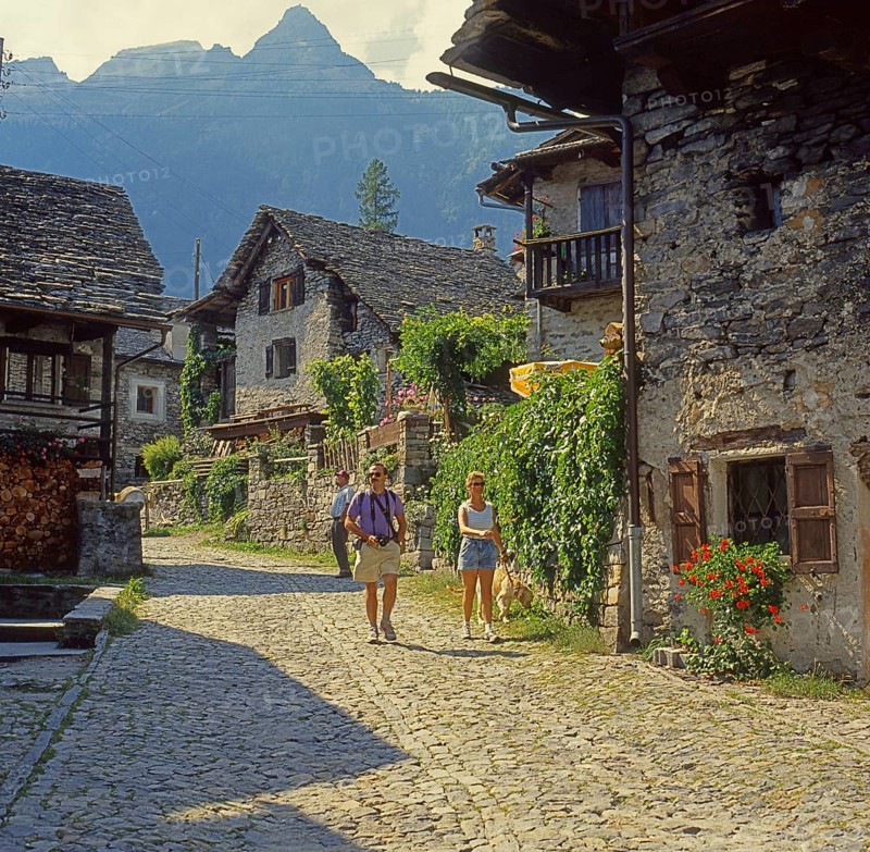 Street in the old village of Sonogno in the Verzasca valley, Ticino region, Switzerland, Europe. Scanned 6x6 slide, Europe