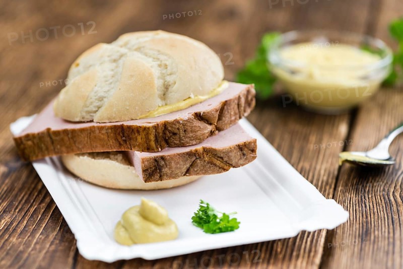 Leberkaese on a vintage background as detailed close-up shot (selective focus)