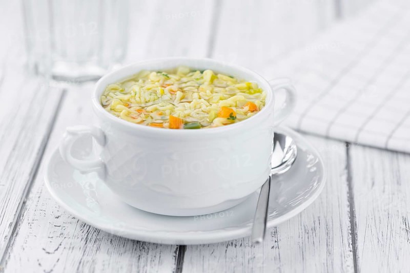Portion of fresh made Alphabet Soup (selective focus, close-up shot)