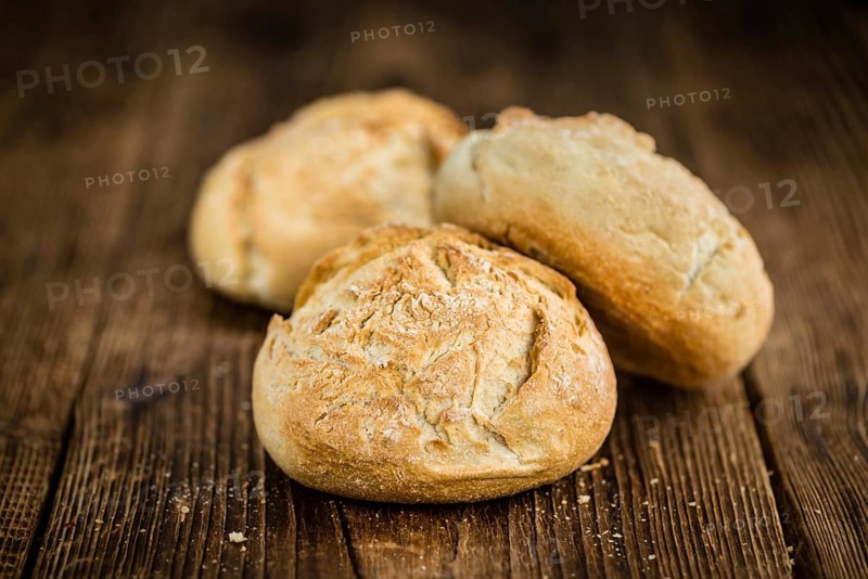 Fresh made German Buns on a vintage background as detailed close-up shot