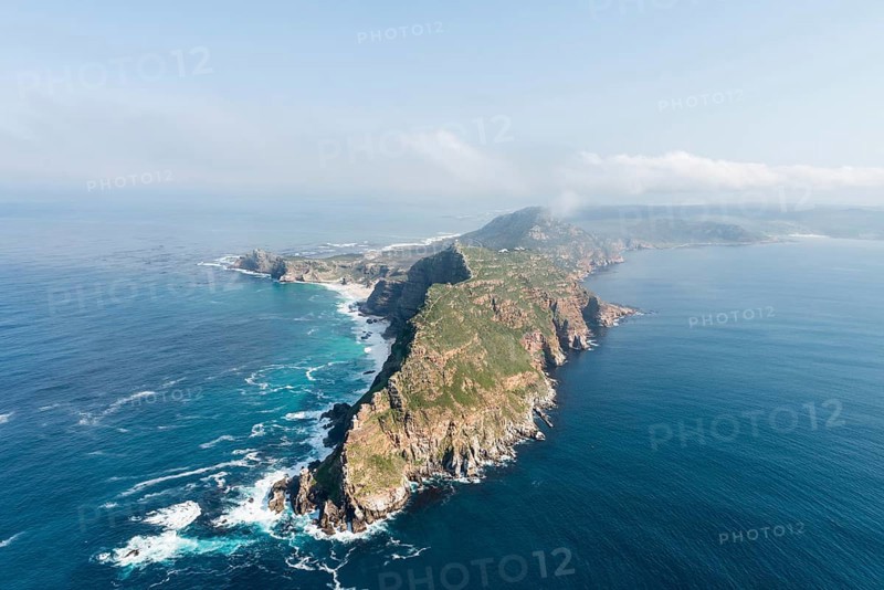 The famous Cape Point South Africa aerial view shot from a helicopter (with cape of good hope in the background)