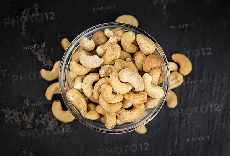Portion of Cashew Nuts (close up shot, selective focus)