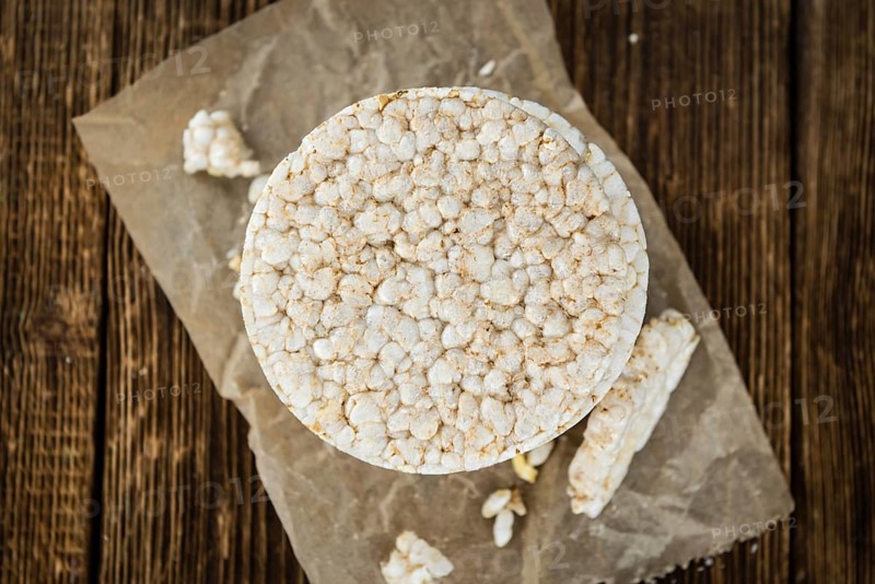 Some Rice Cakes on an old wooden background (detailed close-up shot)