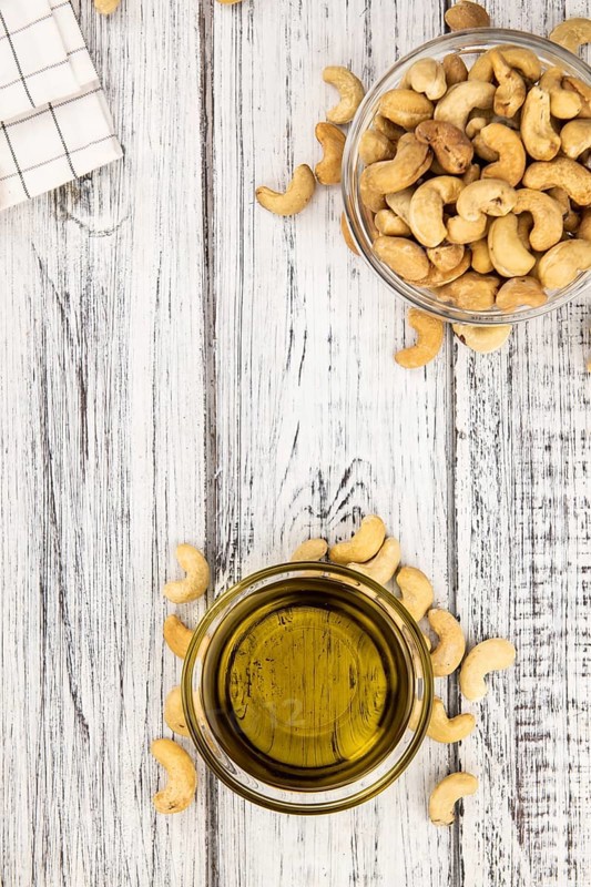 Portion of Cashew Oil (detailed close up shot, selective focus)