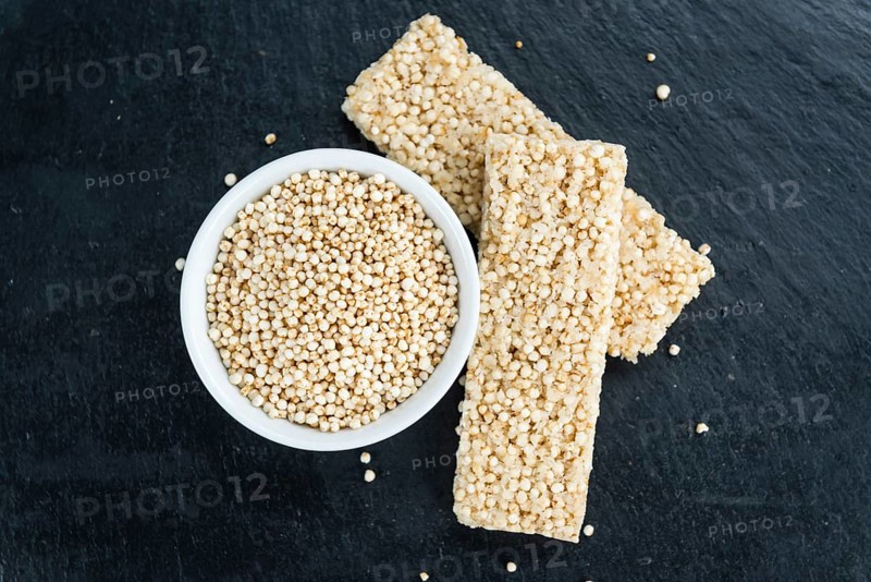Some fresh made Quinoa Bars on vintage background (close-up shot)