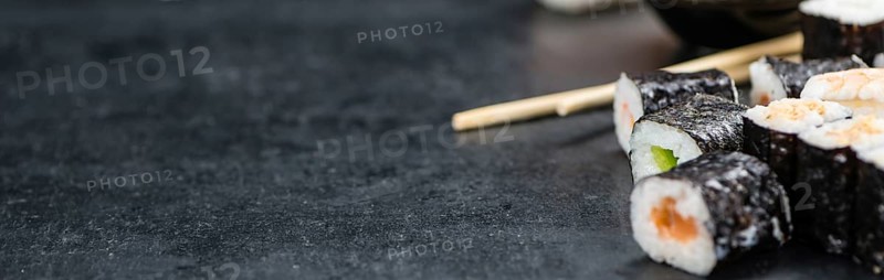 Fresh made Sushi (selective focus) on a vintage looking slate slab