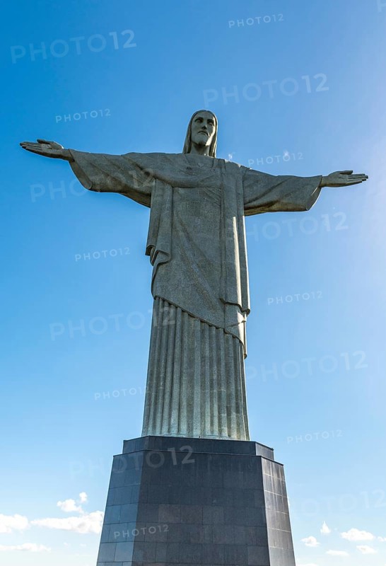 Christ the Redeemer statue in Rio de Janeiro, Brazil with blue sky in the background