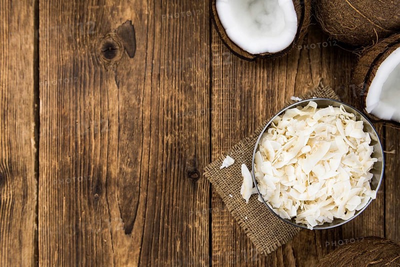 Fresh Coconut Flakes as detailed close-up shot (selective focus)
