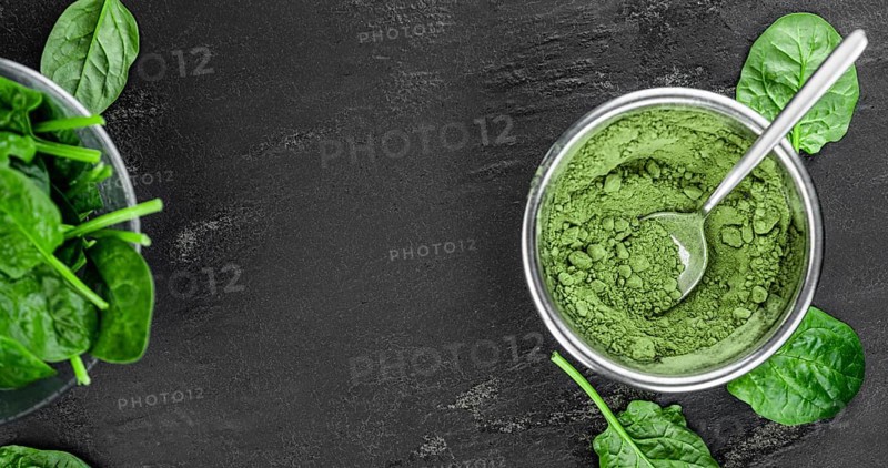 Homemade green spinach powder (close up shot, selective focus)