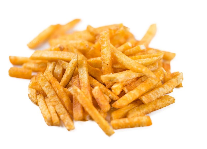 Potato Sticks isolated on white background (close-up shot)