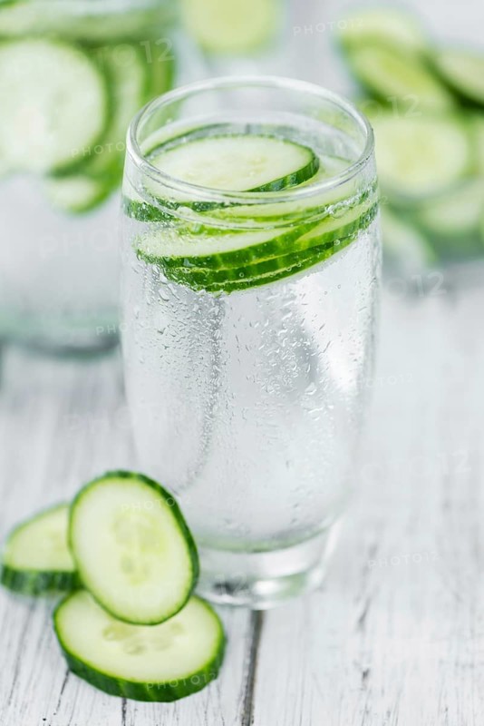 Homemade Cucumber Water on vintage background selective focus, close-up shot