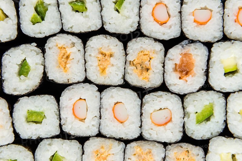 Fresh made Sushi (selective focus) on a vintage looking slate slab