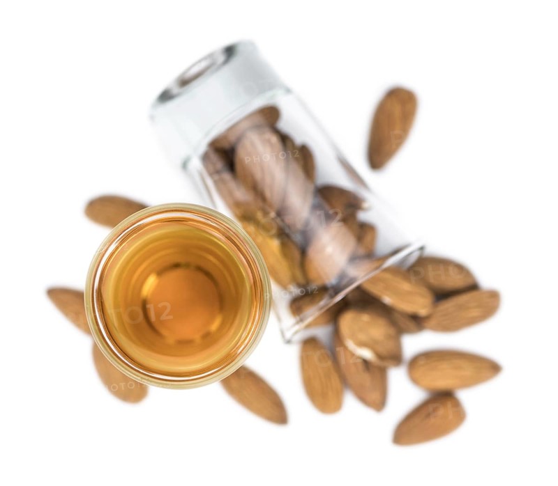 Amaretto as detailed close-up shot isolated on white background (selective focus)