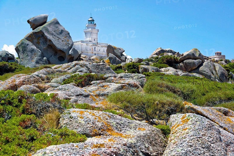 Europe Italy Island of Sardinia Capo Testa lighthouse with rocks