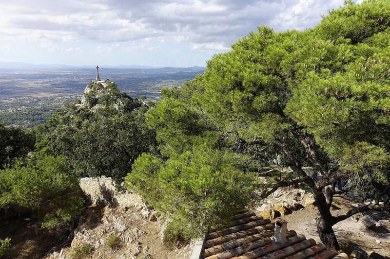 View from the Santuari de Sant Salvador to the cross of Es Picot Majorca Spain