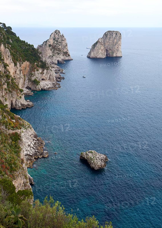 Faraglioni, famous giant rocks, Capri island in Italy