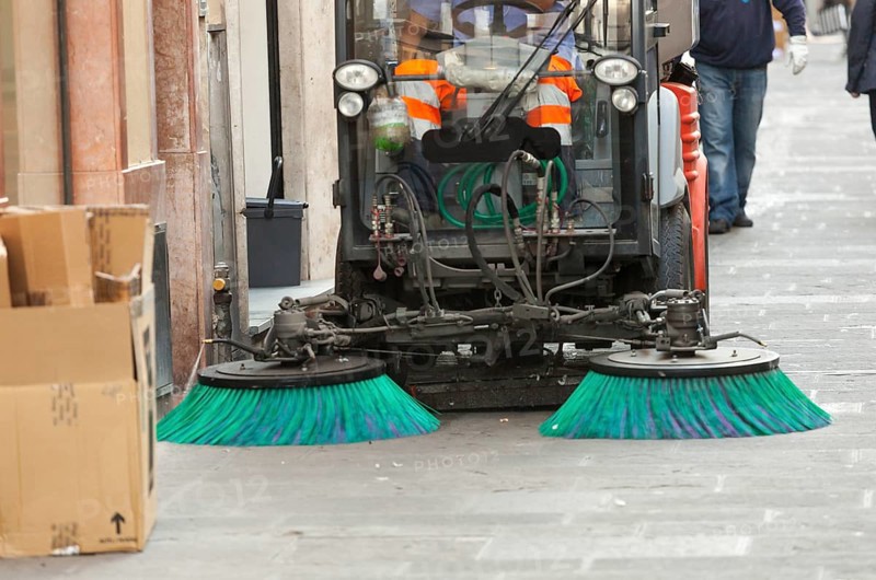 A street sweeper machine cleaning the streets