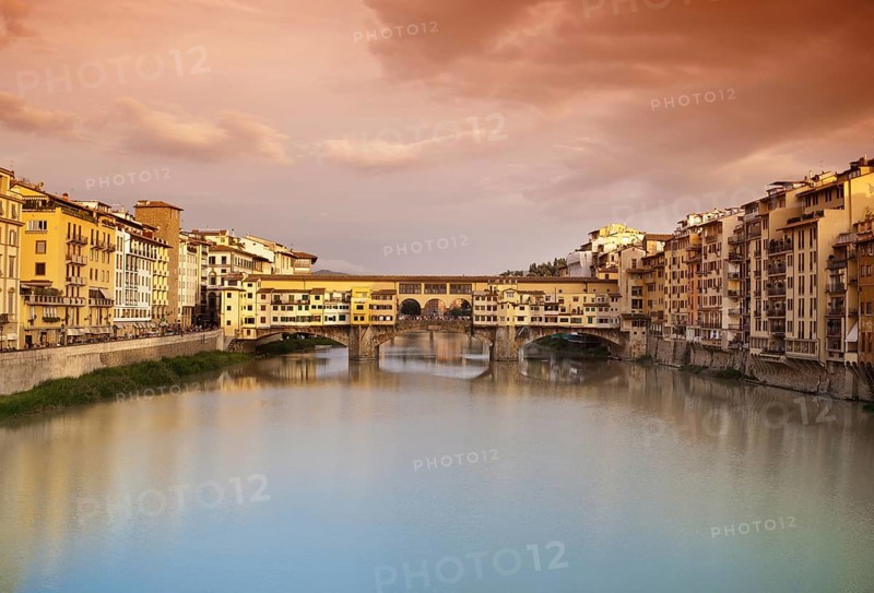Far view at sunset of Ponte Vecchio in Florence, Italy, Europe