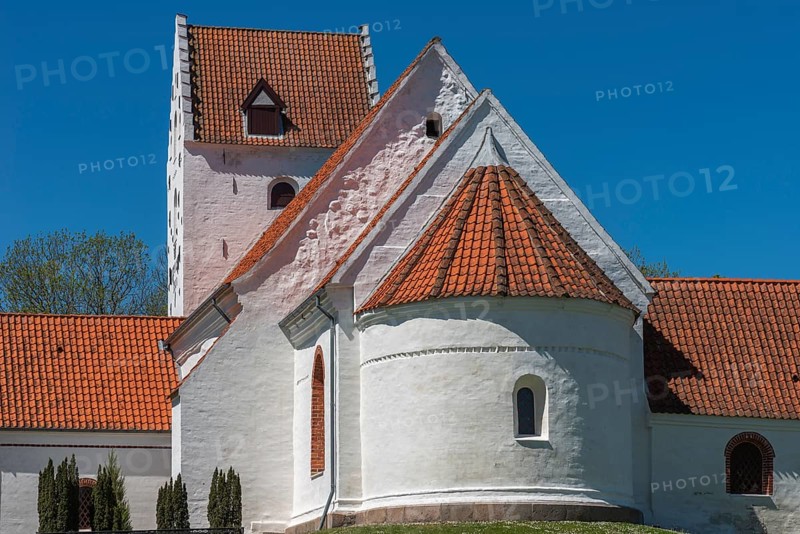 Lindelse Kirke, typical Danish church from 1830, whitewashed, red tiled roof, hill, steeple with stepped gable, apse, Rudkobing, Langeland Island, South Funen, Danish South Sea, Baltic Sea, Denmark, Europe