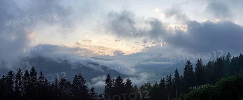 Evening clouds and fog over the Liesingtal, in the valley the village Traboch, Schoberpass federal road, panoramic view, view from the lowlands, Leoben, Styria, Austria, Europe