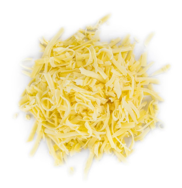 Grated Cheese isolated on white background (close-up shot, selective focus)