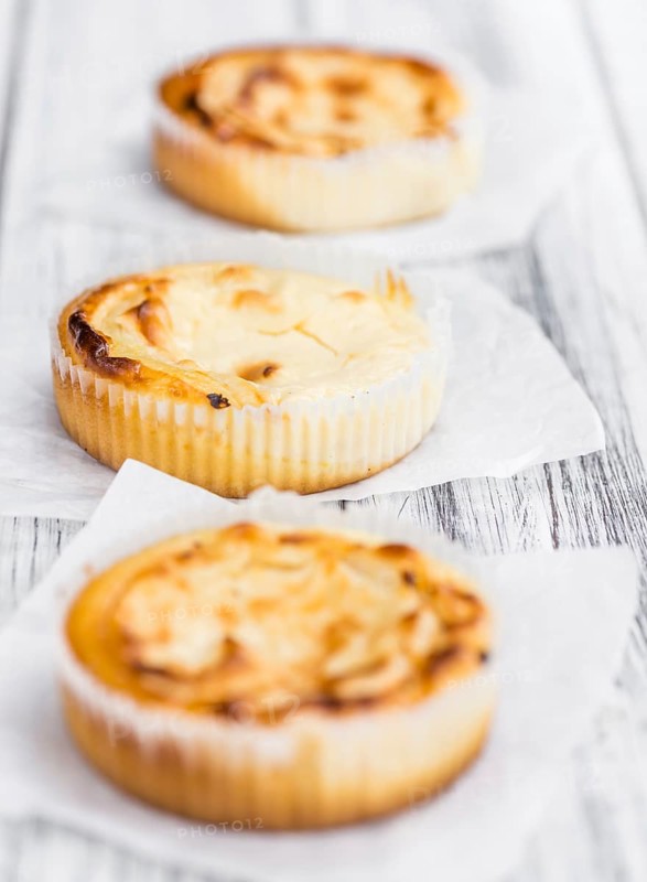 Homemade Cheesecake on an wooden table (selective focus) as detailed close-up shot